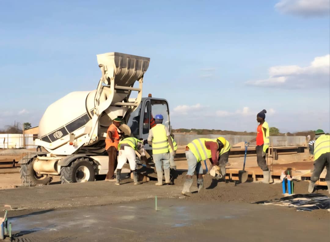 Active construction site with workers and equipment